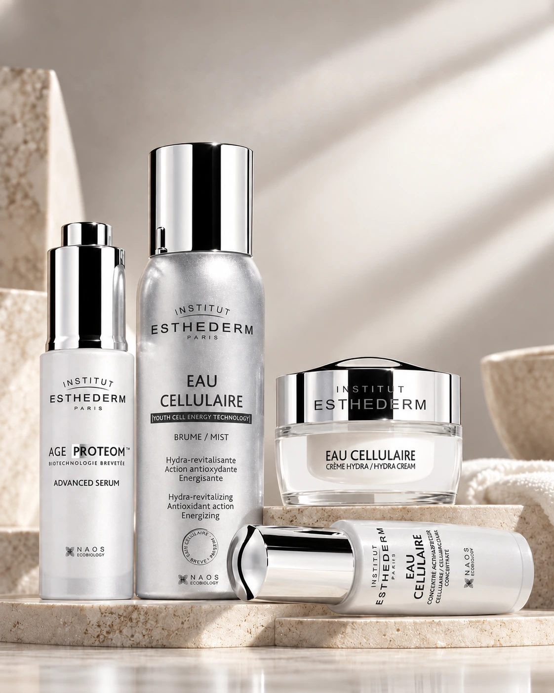 Sérum Age Proteom, brume et crème Eau Cellulaire Institut Esthederm, en vente à L'INSTITUT K Nancy
